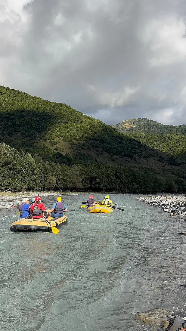 Two rafts on the turquoise water of the gorge