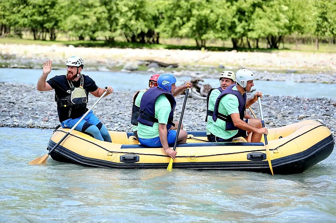 Celebrating a run with paddles raised