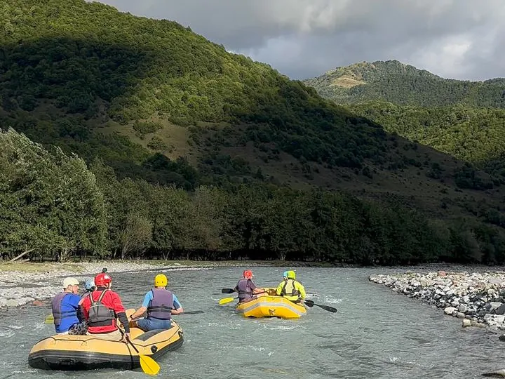 Two rafts on the turquoise water of the White Aragvi gorge